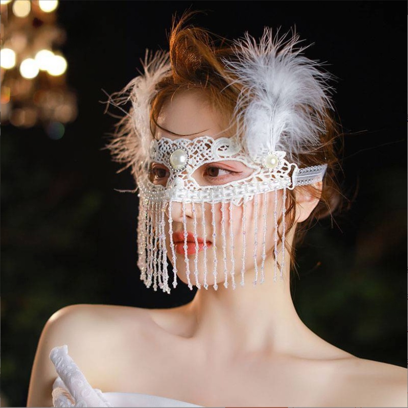 Elegant Masquerade Mask With White Feather and Pearl Accents